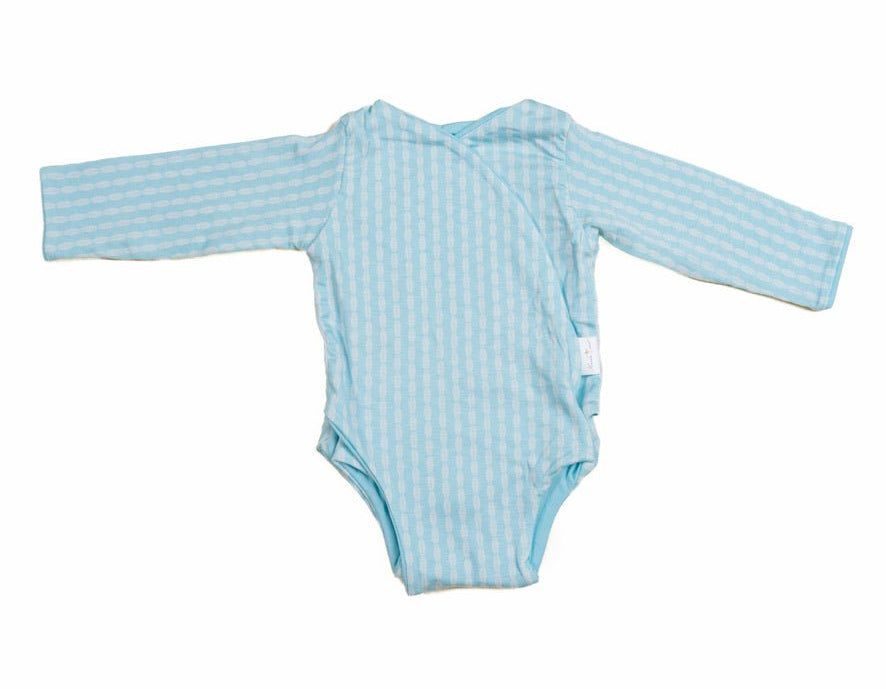 Lil Surfer design long sleeve winged bodysuit in silky modal fabric.
