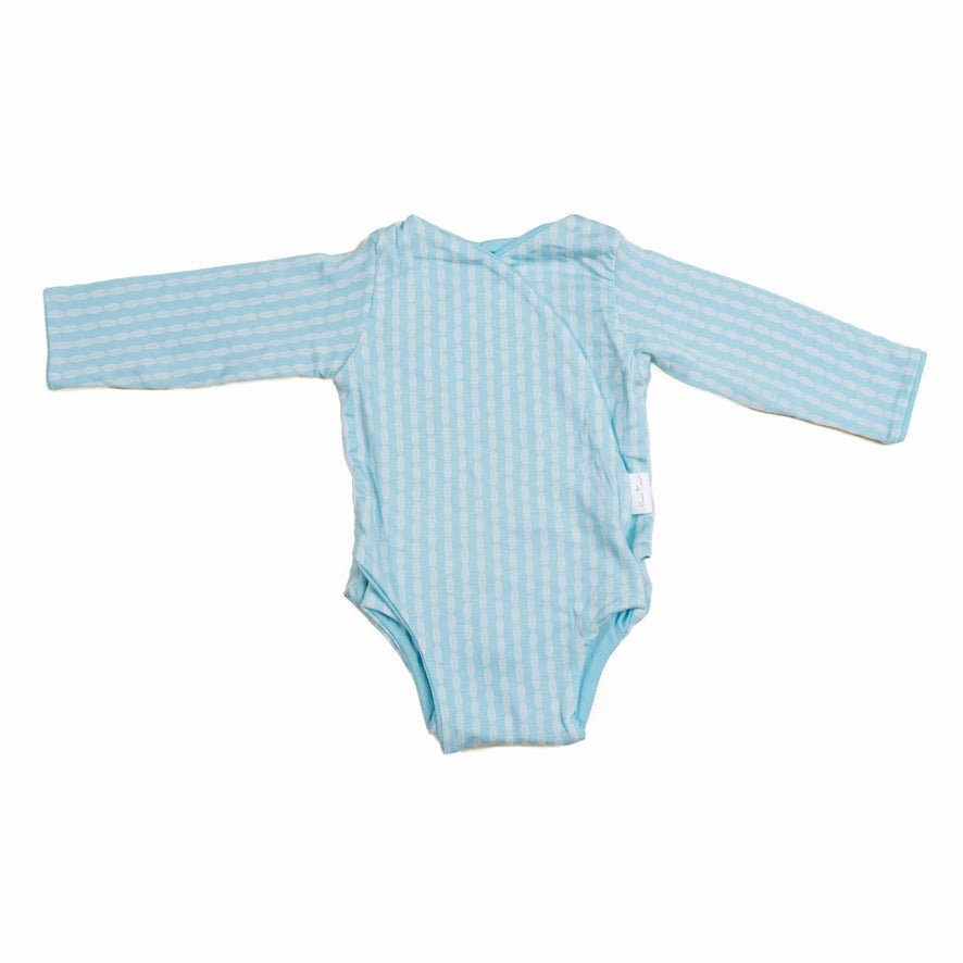 Lil Surfer design long sleeve winged bodysuit in silky modal fabric.