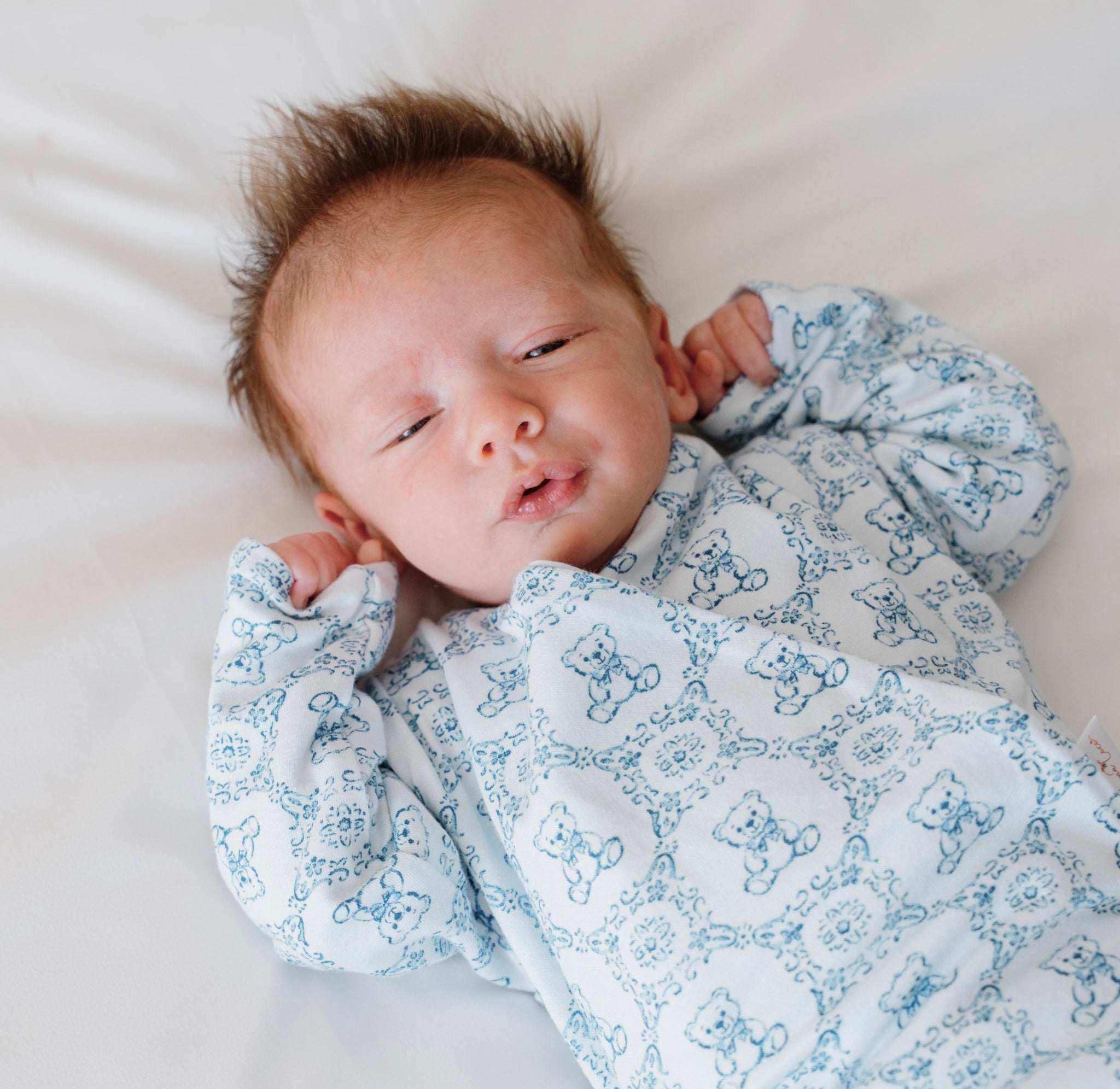 Long-sleeve winged bodysuit for babies.