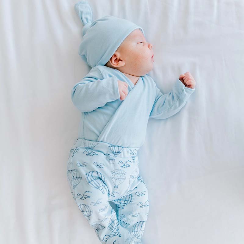 Reversible long-sleeve baby onesie outfit bundle made from bamboo cotton in bon voyage design.