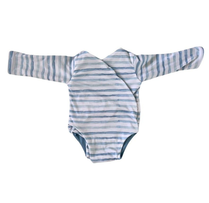 Long-sleeve winged bodysuit in chambray waves design.