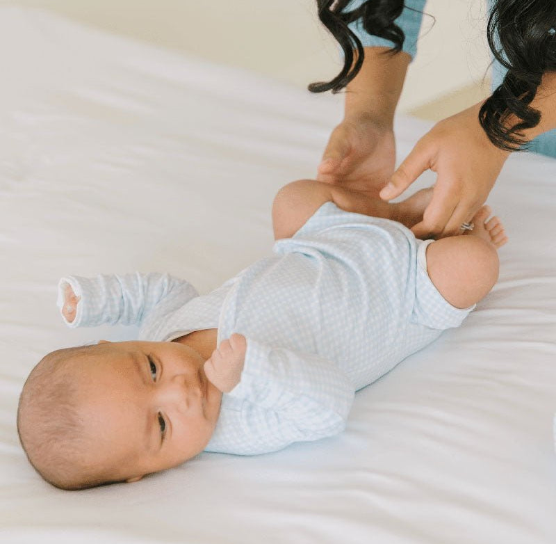Baby Blue Gingham design long-sleeved winged bodysuit.