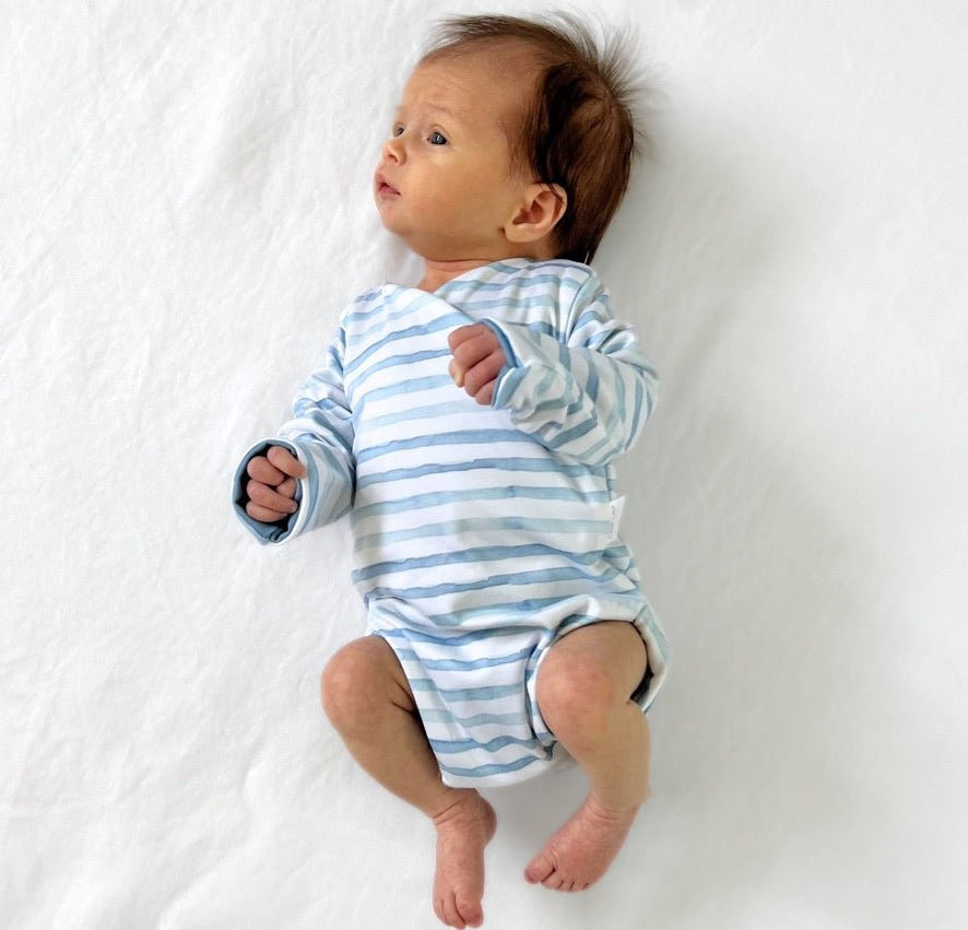 Chambray Waves design long-sleeved winged bodysuit.