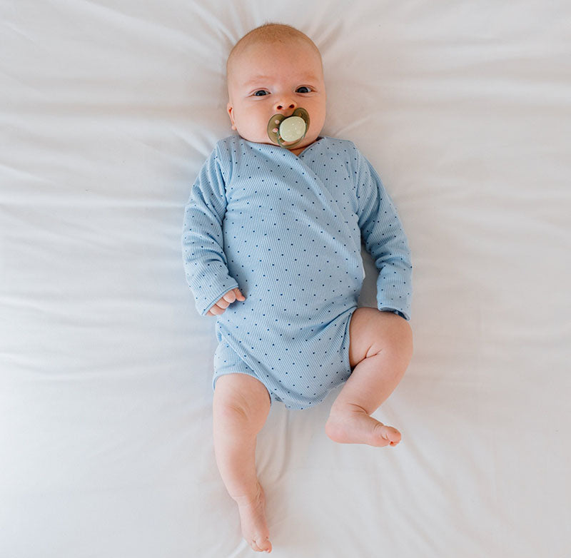 Dotted Blues design long-sleeved winged bodysuit.