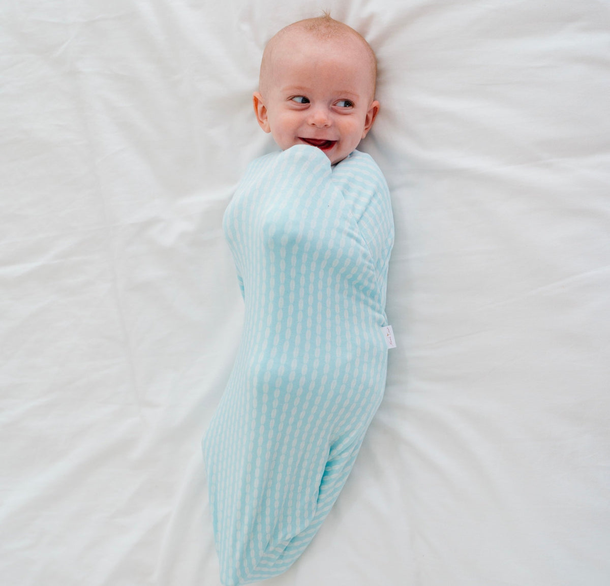 Silky modal long-sleeve newborn essentials bundle in lil surfer design.