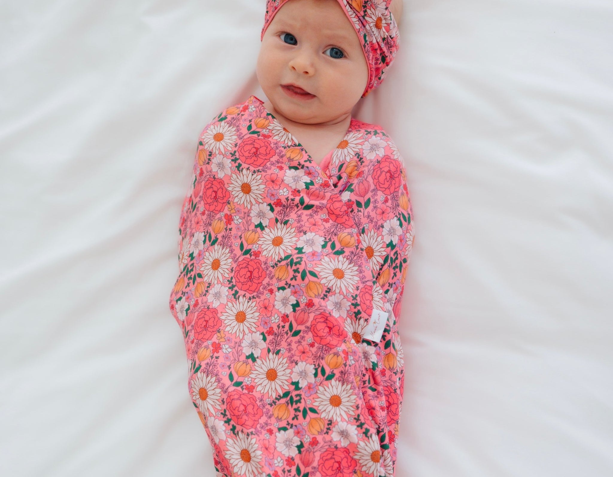 Classic brushed fabric newborn essentials bundle in flower power design.