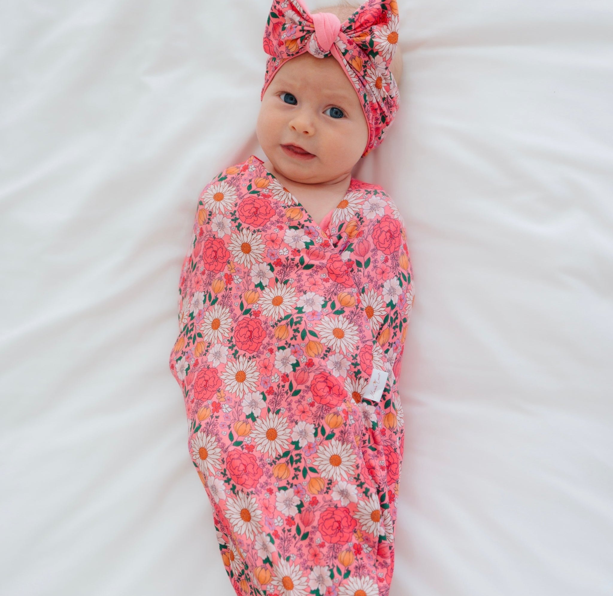 Classic brushed fabric newborn essentials bundle in flower power design.