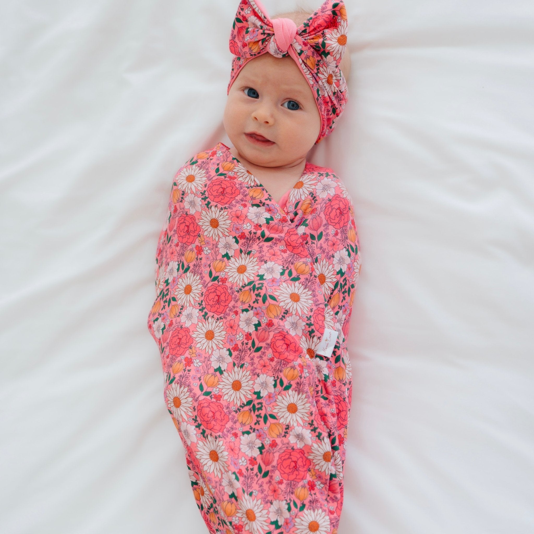 Classic brushed fabric newborn essentials bundle in flower power design.