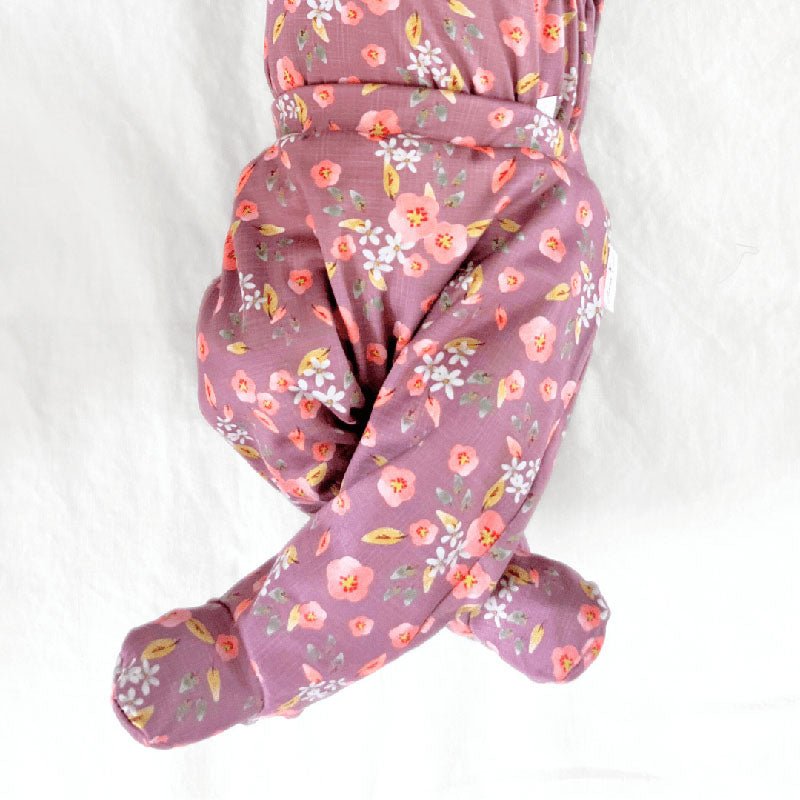 Peachy Lilac baby footie pants made with breathable bamboo cotton fabric.