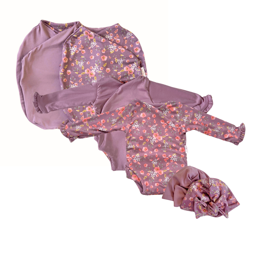 Classic brushed long sleeve newborn baby bundle, featuring adorable ruffle cuffs in peachy lilac design.