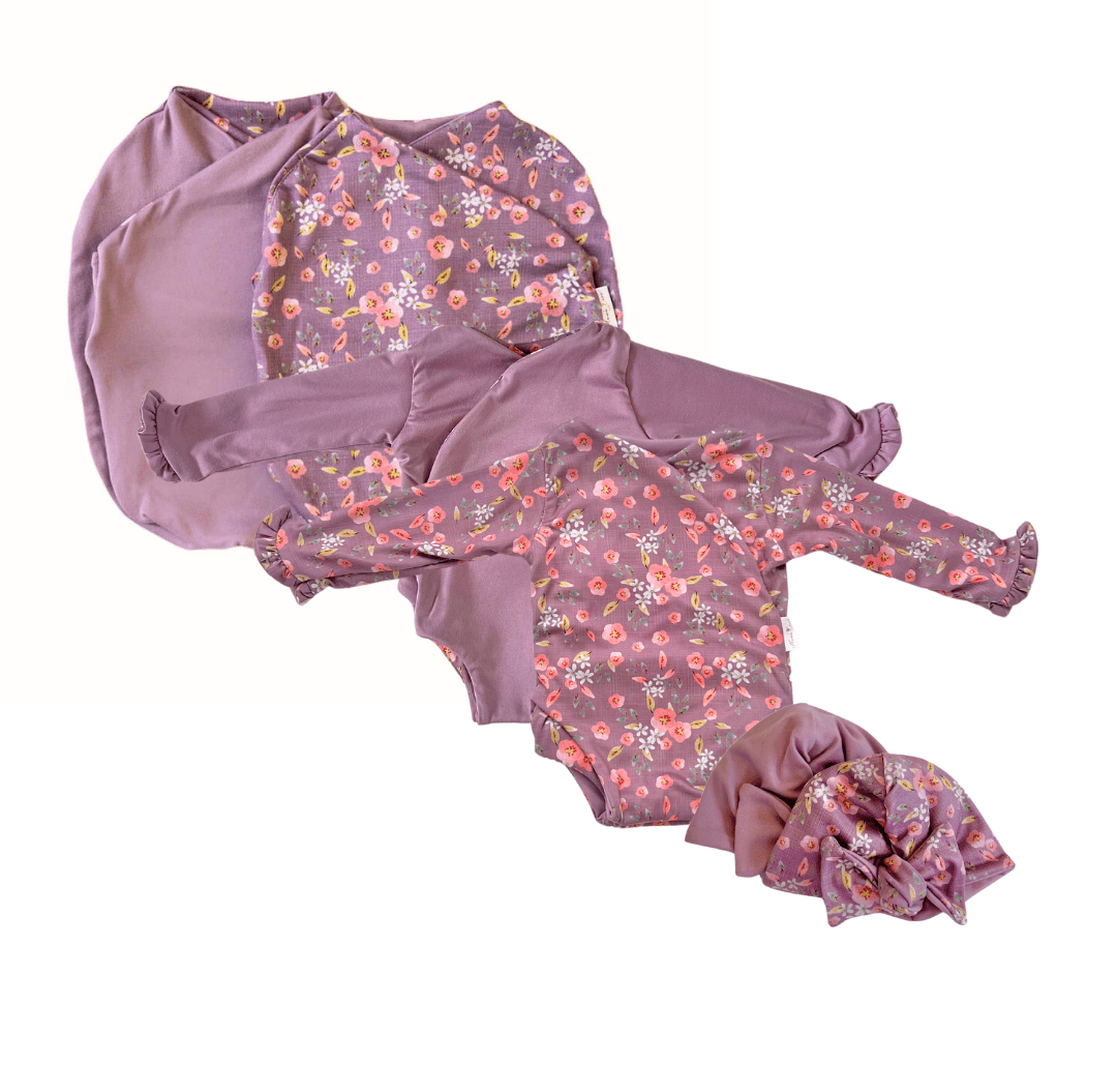 Classic brushed long sleeve newborn baby bundle, featuring adorable ruffle cuffs in peachy lilac design.