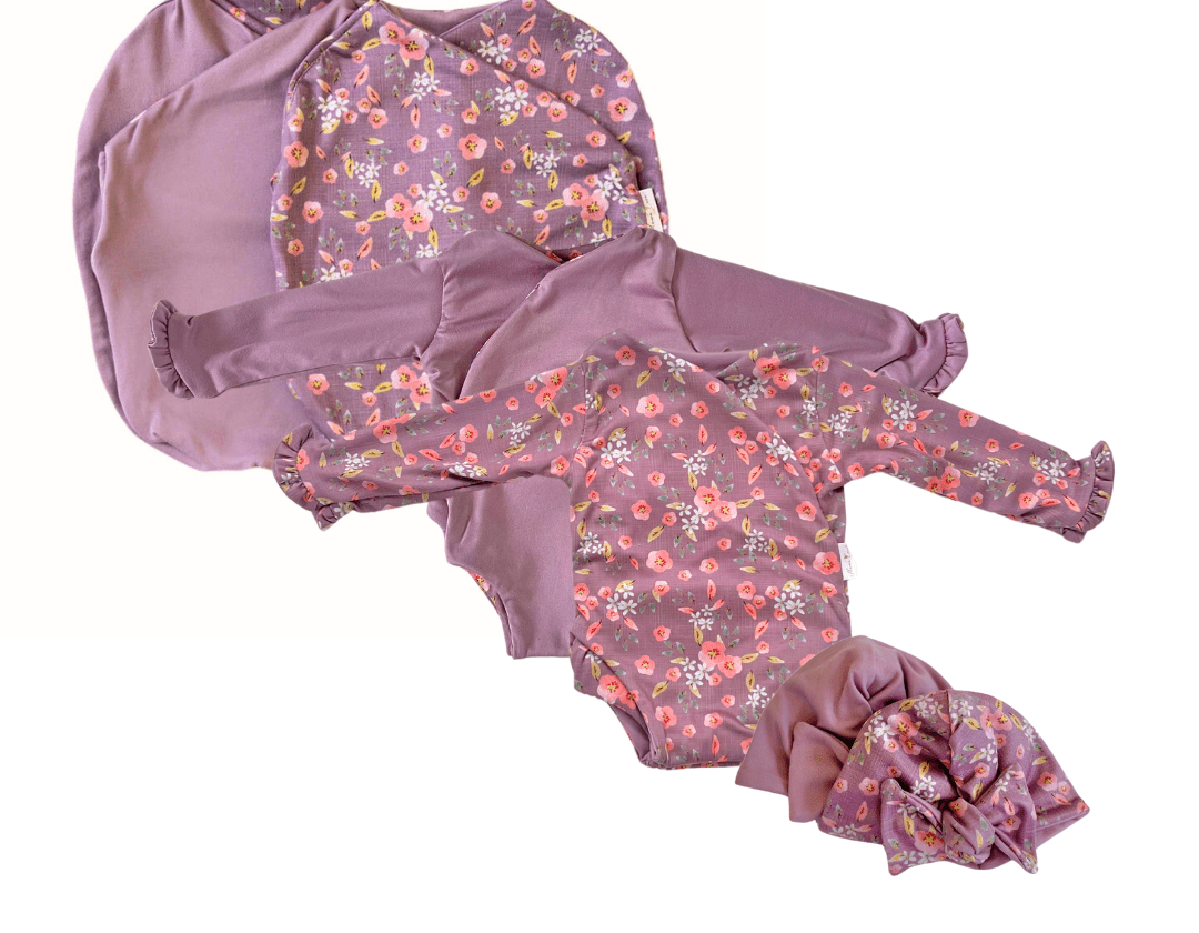 Classic brushed long sleeve newborn baby bundle, featuring adorable ruffle cuffs in peachy lilac design.