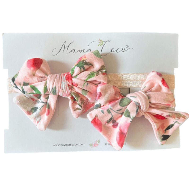 Baby headband with bow and matching bow clip in Peachy Rose Fields Classic Brushed fabric.