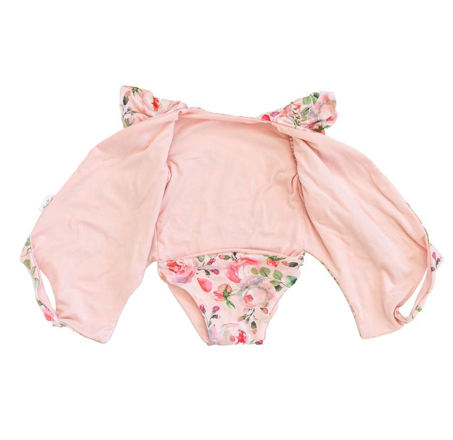Reversible floral baby bodysuit featuring Peachy Rose Fields in premium brushed fabric.