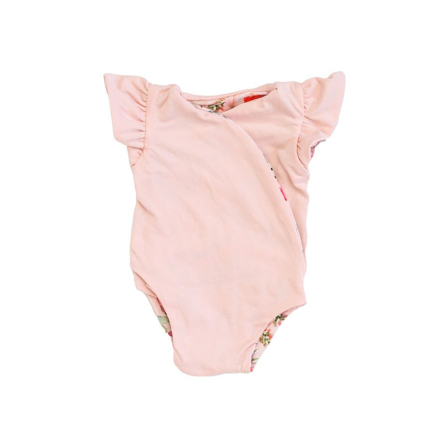 Reversible Peachy Rose Fields short-sleeve baby bodysuit in Classic Brushed fabric styles.