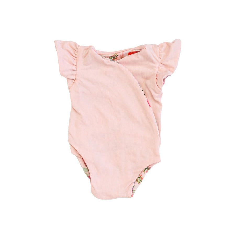 Reversible Peachy Rose Fields short-sleeve baby bodysuit in Classic Brushed fabric styles.