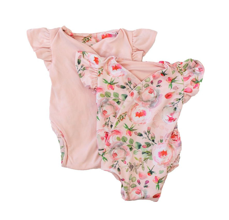 Short-sleeve bodysuit for baby in Classic Brushed fabric styles featuring Peachy Rose Fields.