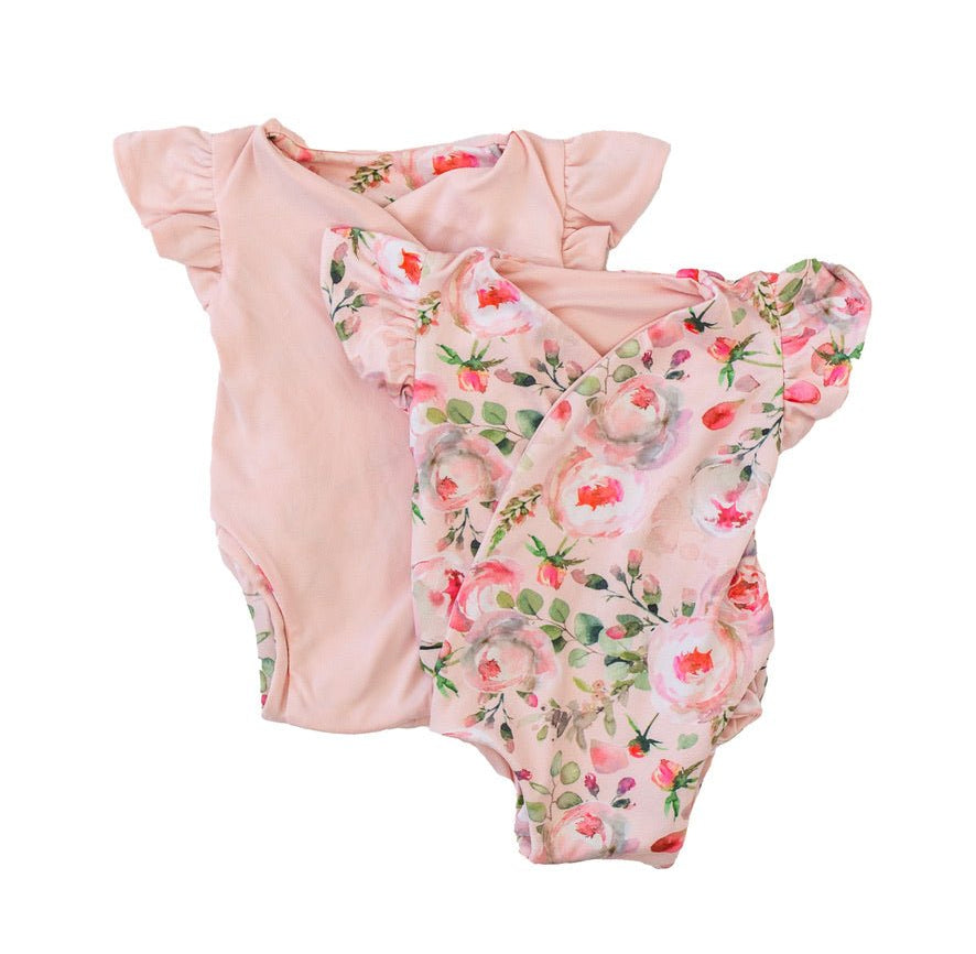 Short-sleeve bodysuit for baby in Classic Brushed fabric styles featuring Peachy Rose Fields.