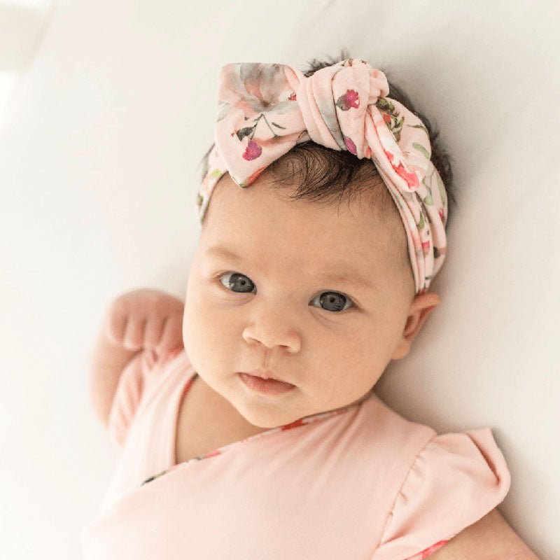 Adorable bow headwrap available in luxurious classic brushed fabric with Peachy Rose Fields design.