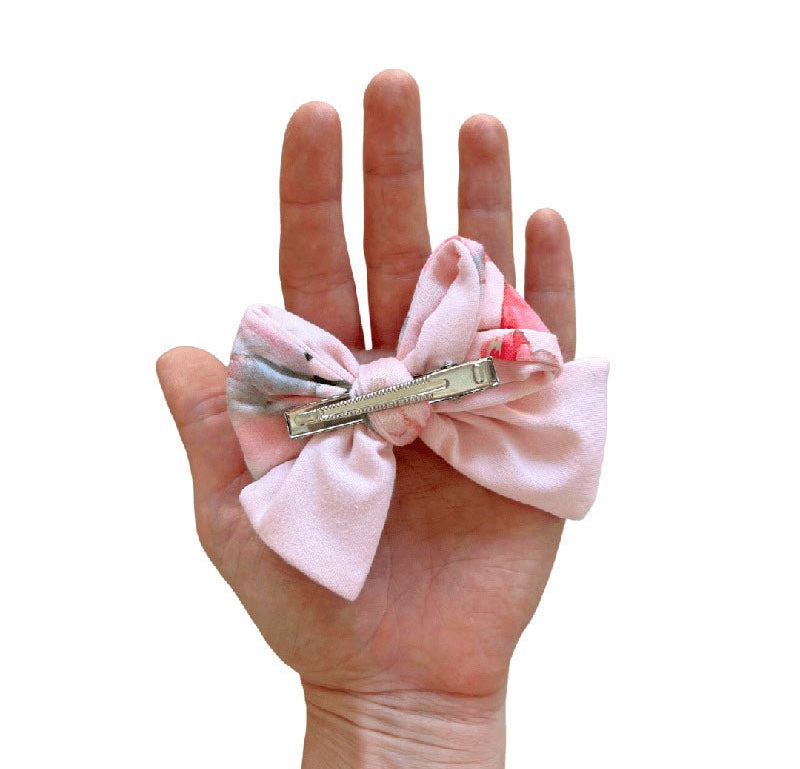 Peachy Rose Fields infant headband with bow and coordinating bow hair clip.