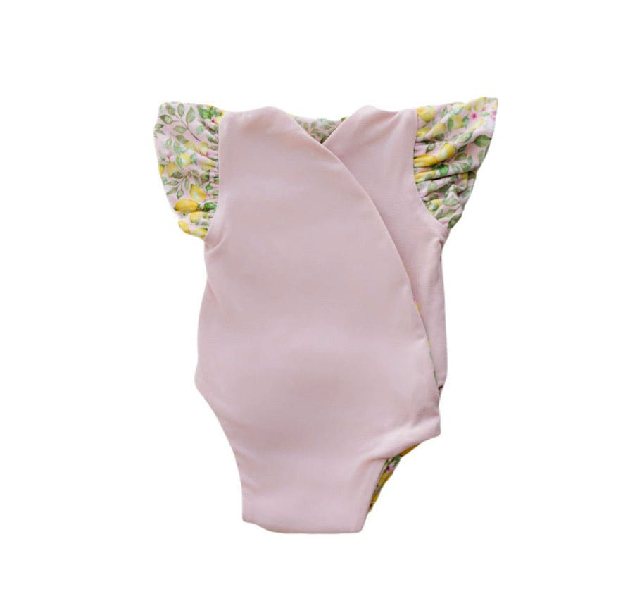 Reversible Pink Lemonade floral baby bodysuit with comfortable short sleeves.