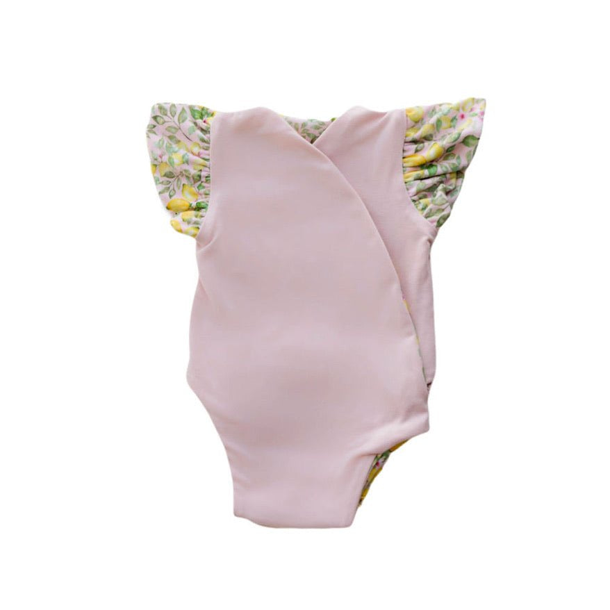 Reversible Pink Lemonade floral baby bodysuit with comfortable short sleeves.