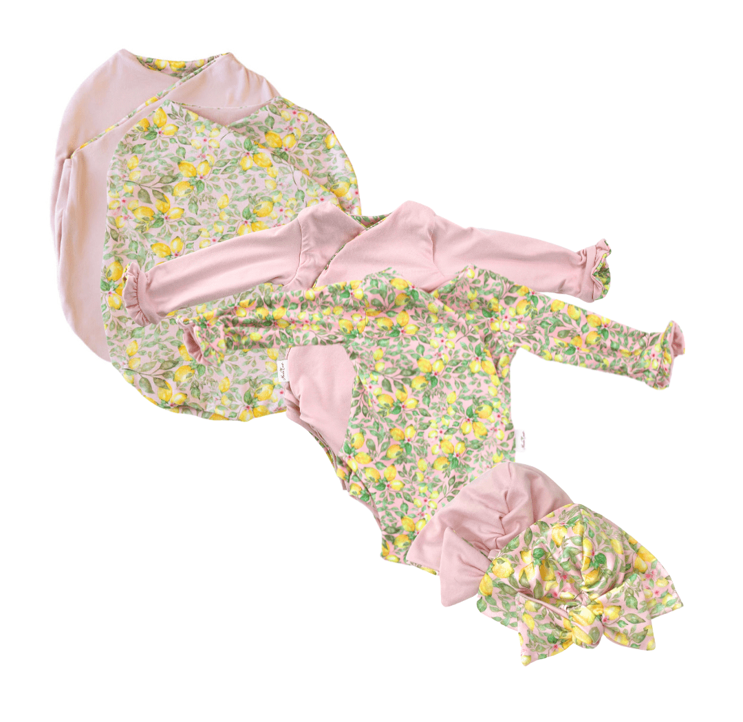 Classic brushed long sleeve newborn baby bundle, featuring adorable ruffle cuffs in pink lemonade design.