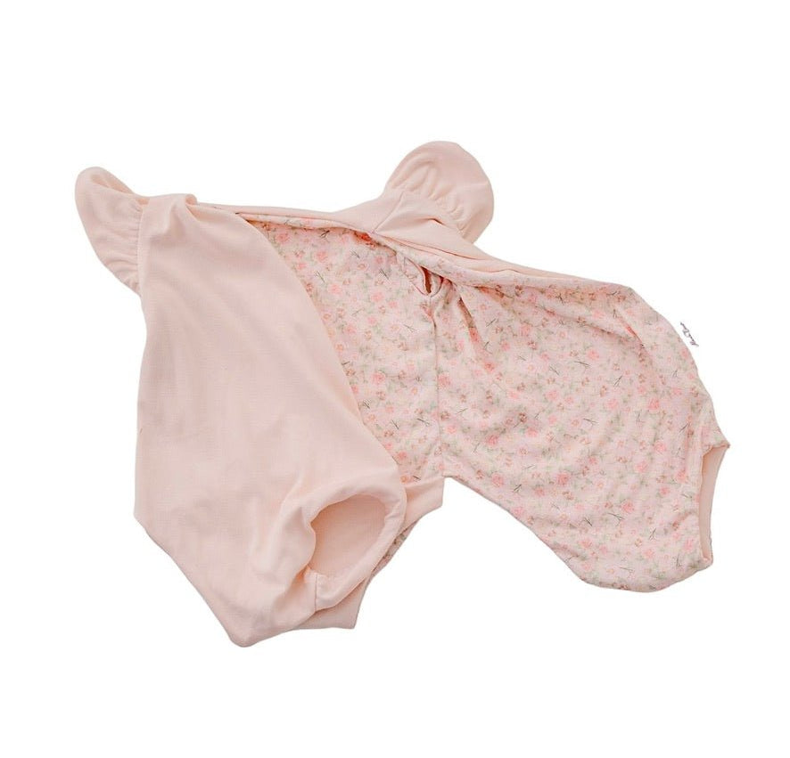 Reversible Dusty Roses short-sleeve bodysuit for baby in soft brushed fabric.