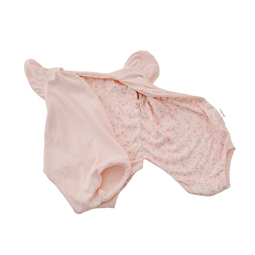 Reversible Dusty Roses short-sleeve bodysuit for baby in soft brushed fabric.