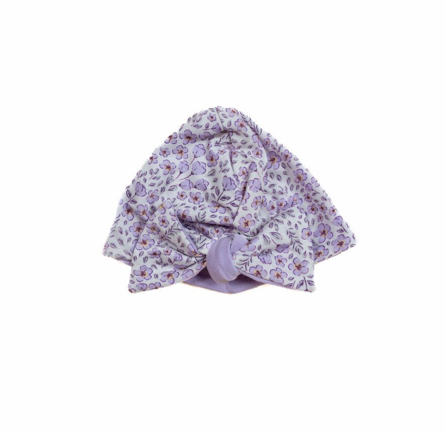 Purple posies design reversible baby knotty beanie in silky modal fabric.