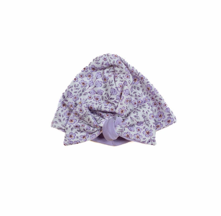 Purple posies design reversible baby knotty beanie in silky modal fabric.