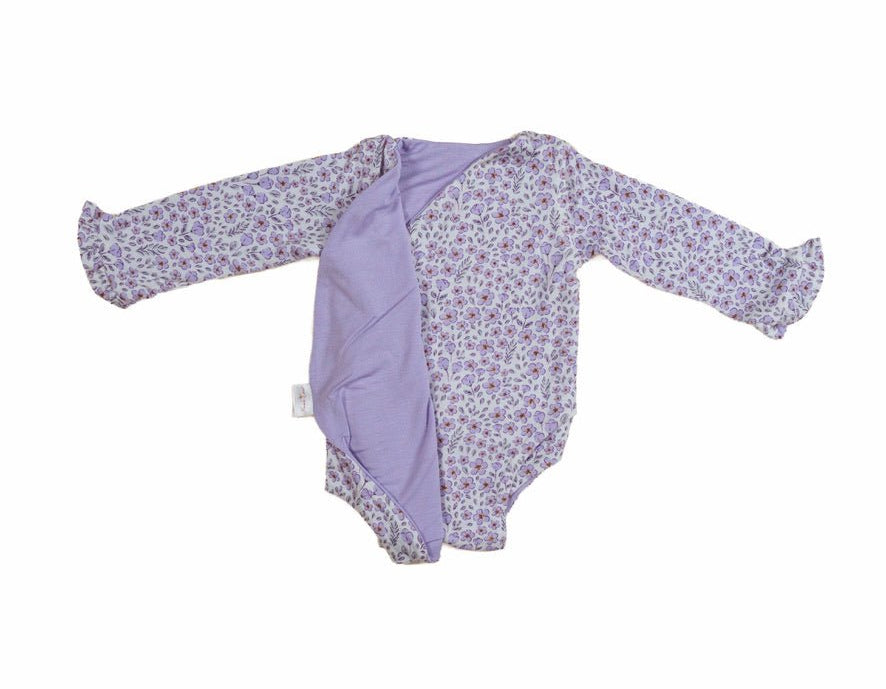Reversible purple posies design baby onesie outfit in silky modal fabric.