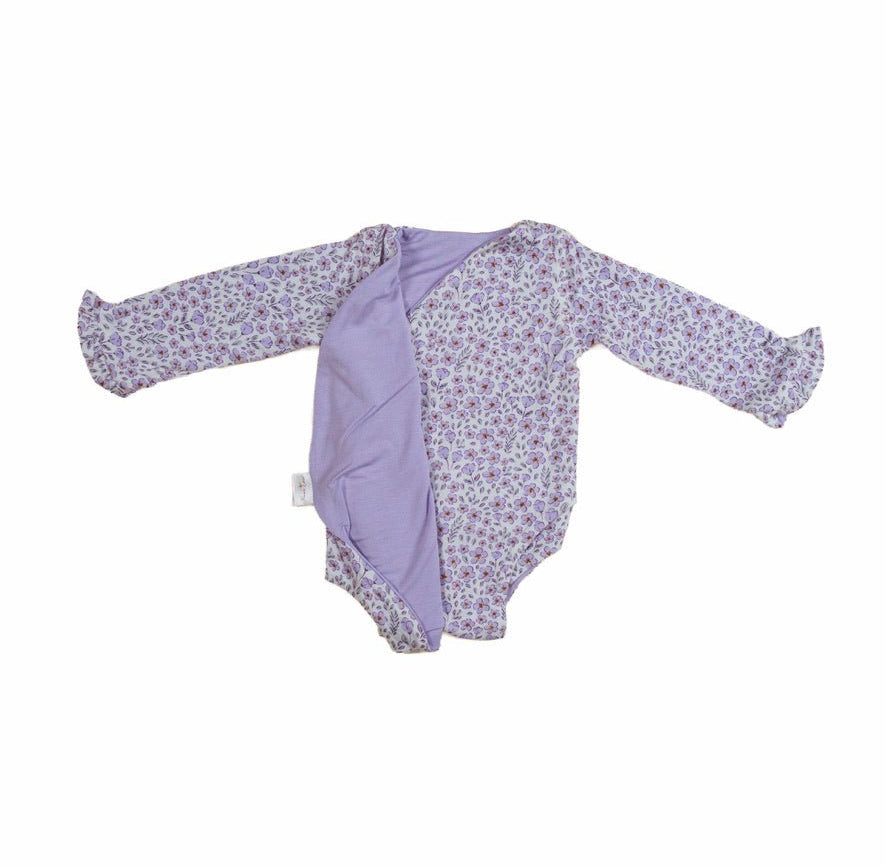 Reversible purple posies design baby onesie outfit in silky modal fabric.