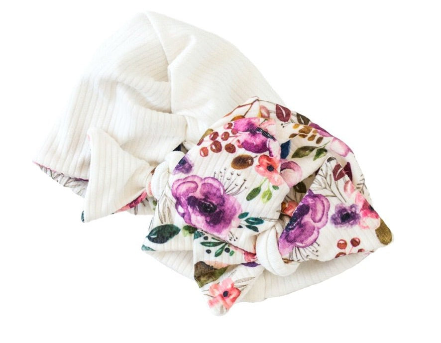 Blushing eucalyptus reversible baby knotty beanie in classic brushed fabric.