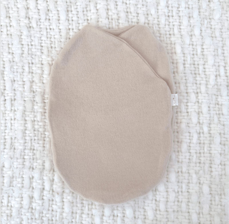 Reversible baby cocoon swaddle.