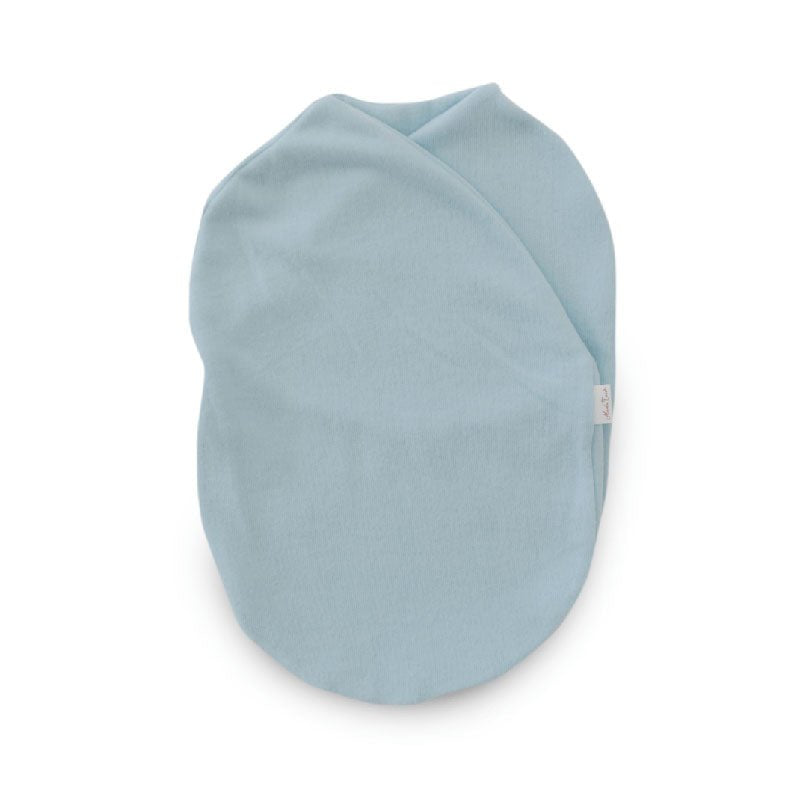 Reversible Baby Cocoon swaddle baby blanket in various fabric styles.