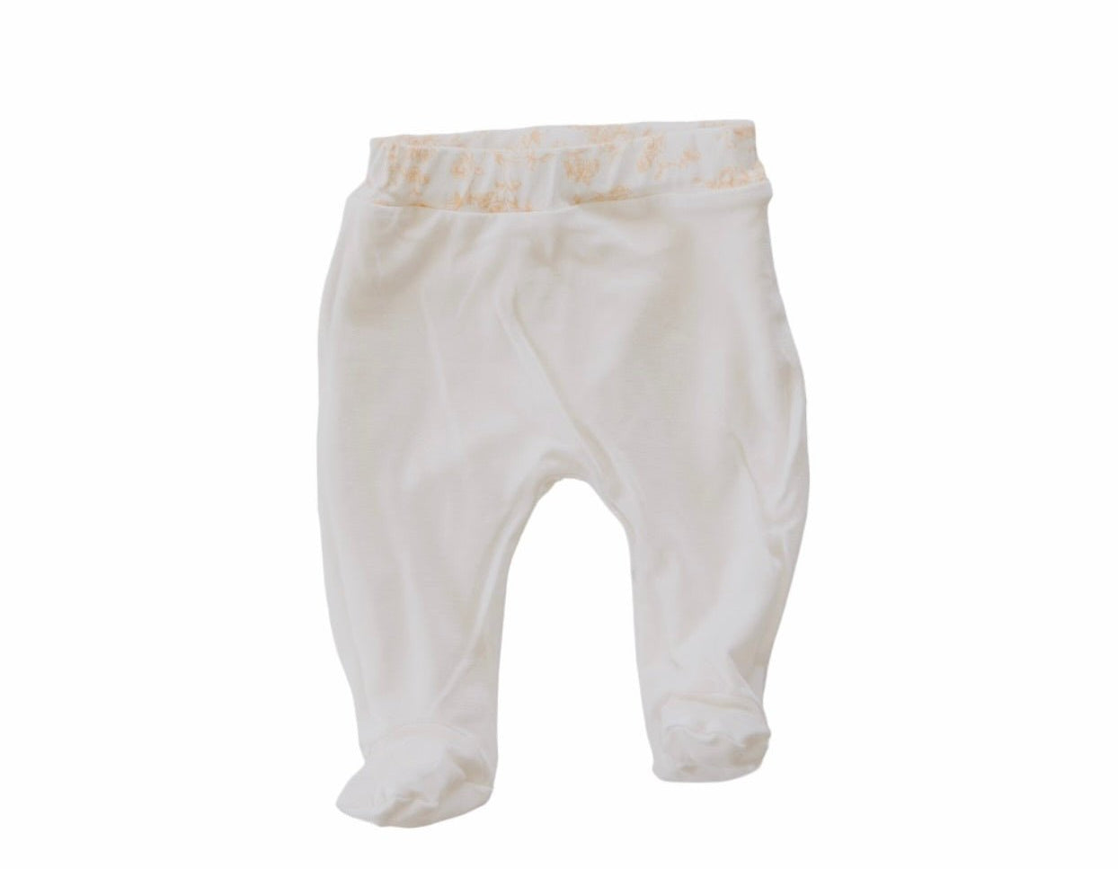 Reversible baby footie pants designed in silky modal fabric featuring our Bitty Blooms design.