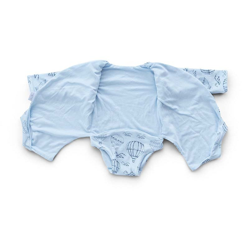 Reversible long-sleeve baby winged bodysuit in bamboo cotton.
