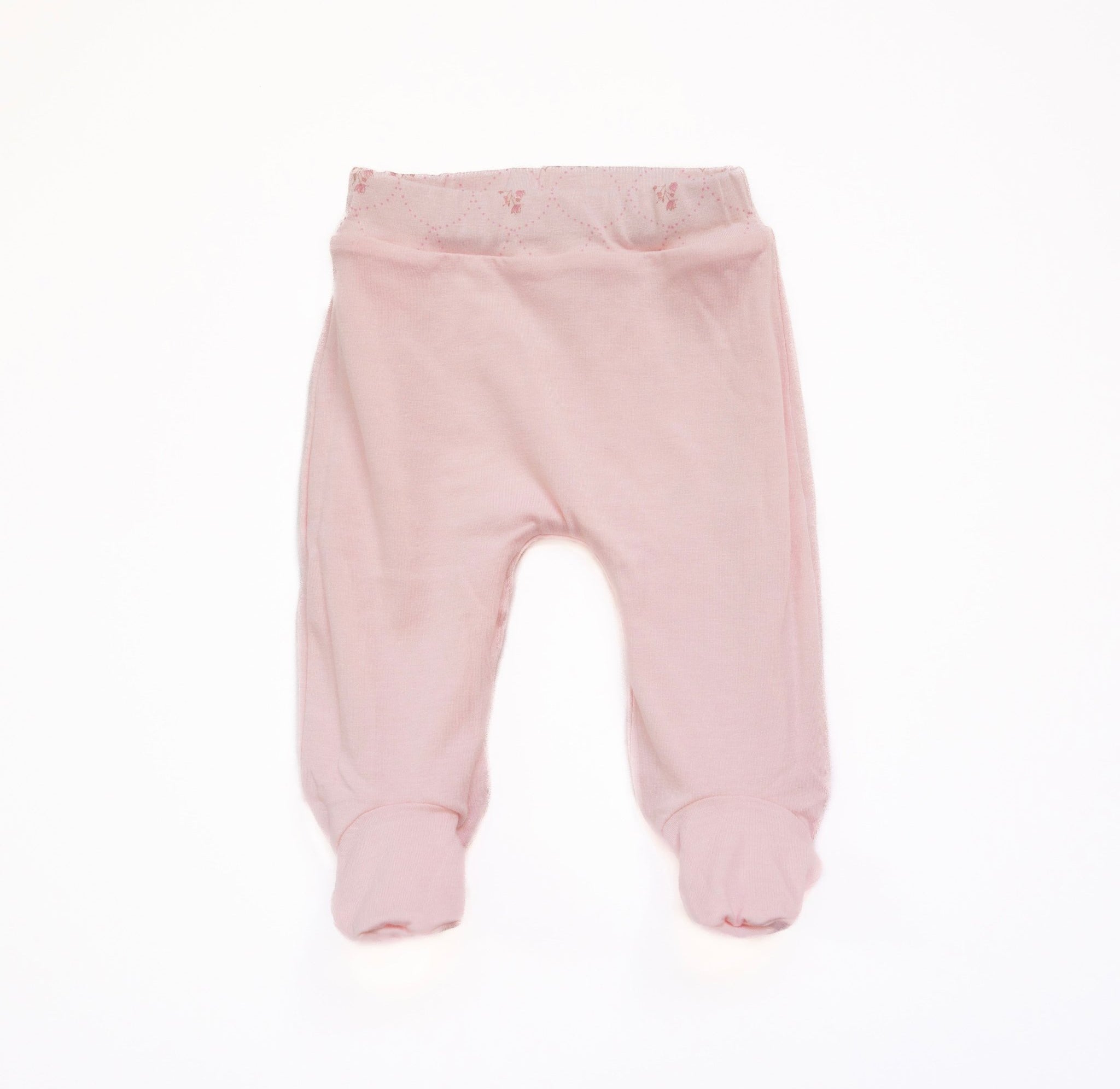 Comfortable bamboo cotton baby footie pants in the Dainty Dots collection.