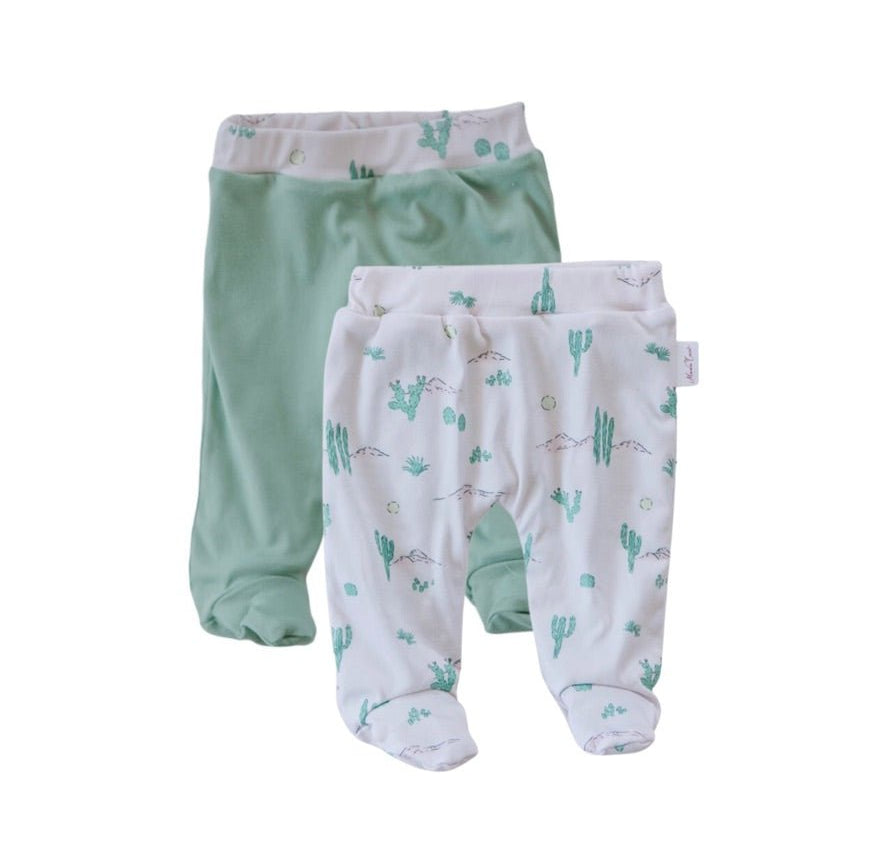 Reversible footie pants in desert sunsets design.