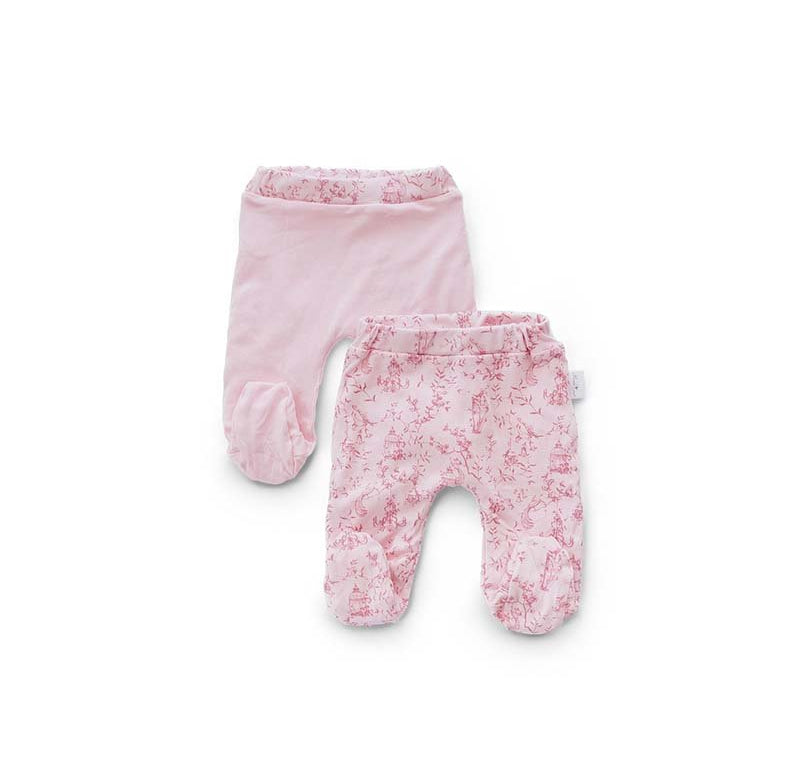 Reversible baby footie pants in whimsical garden design.
