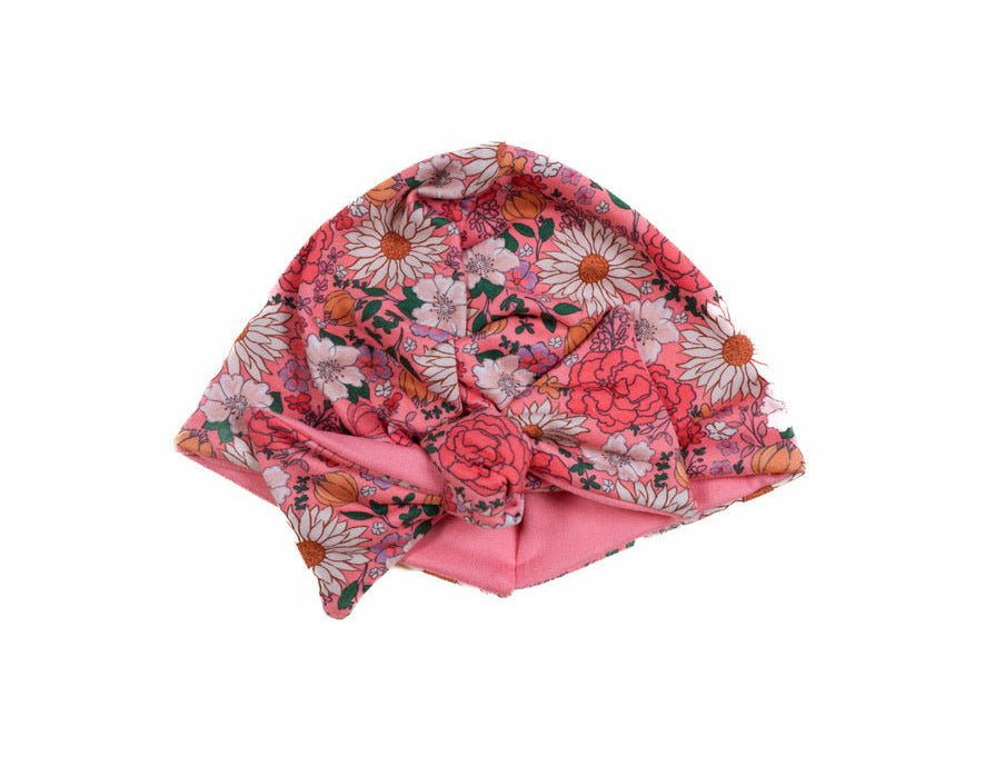 Reversible flower power design baby knotty beanie.