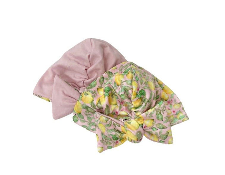 Reversible pink lemonade design baby knotty beanie.