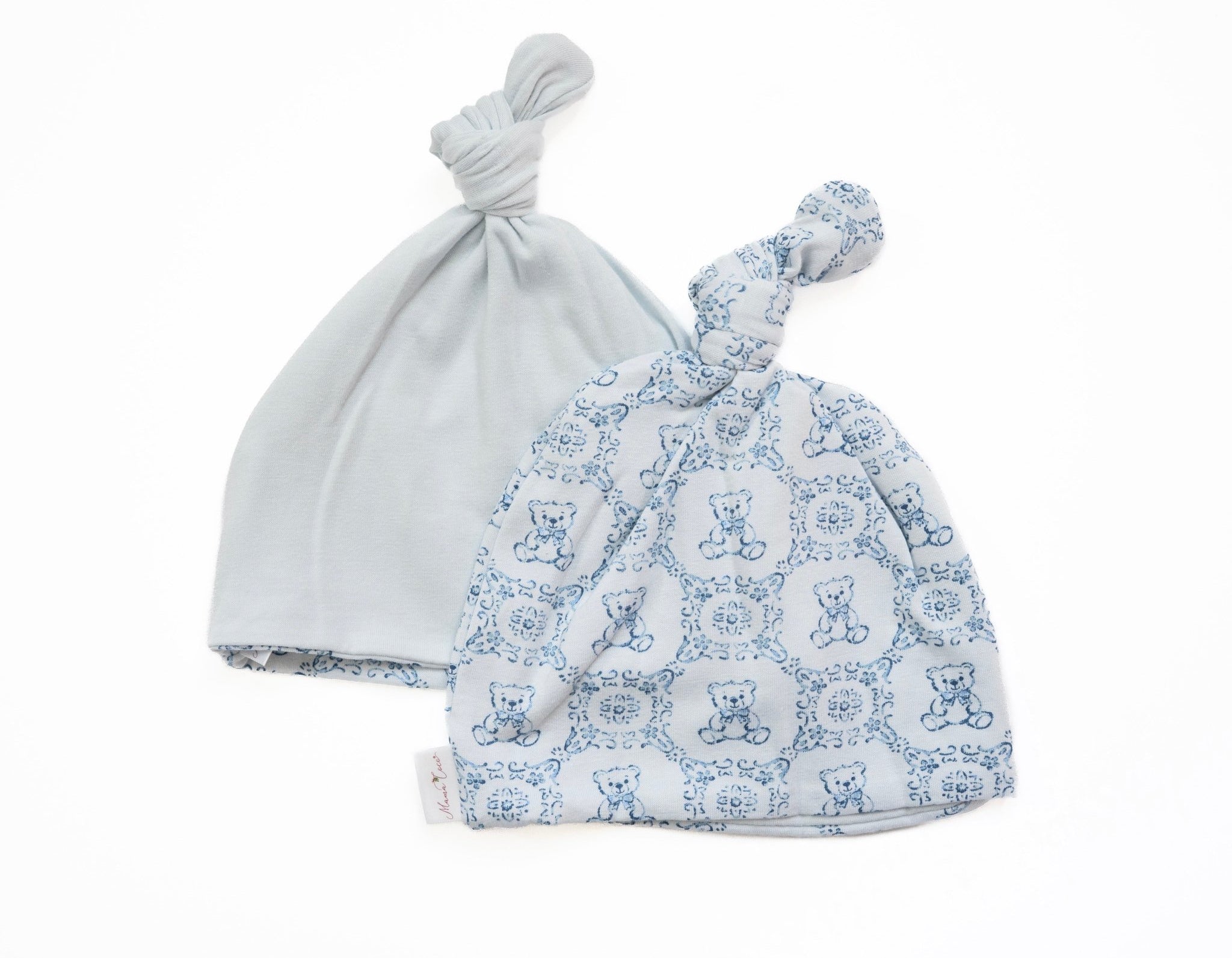 Reversible baby knotty beanie in teddy tiles design.