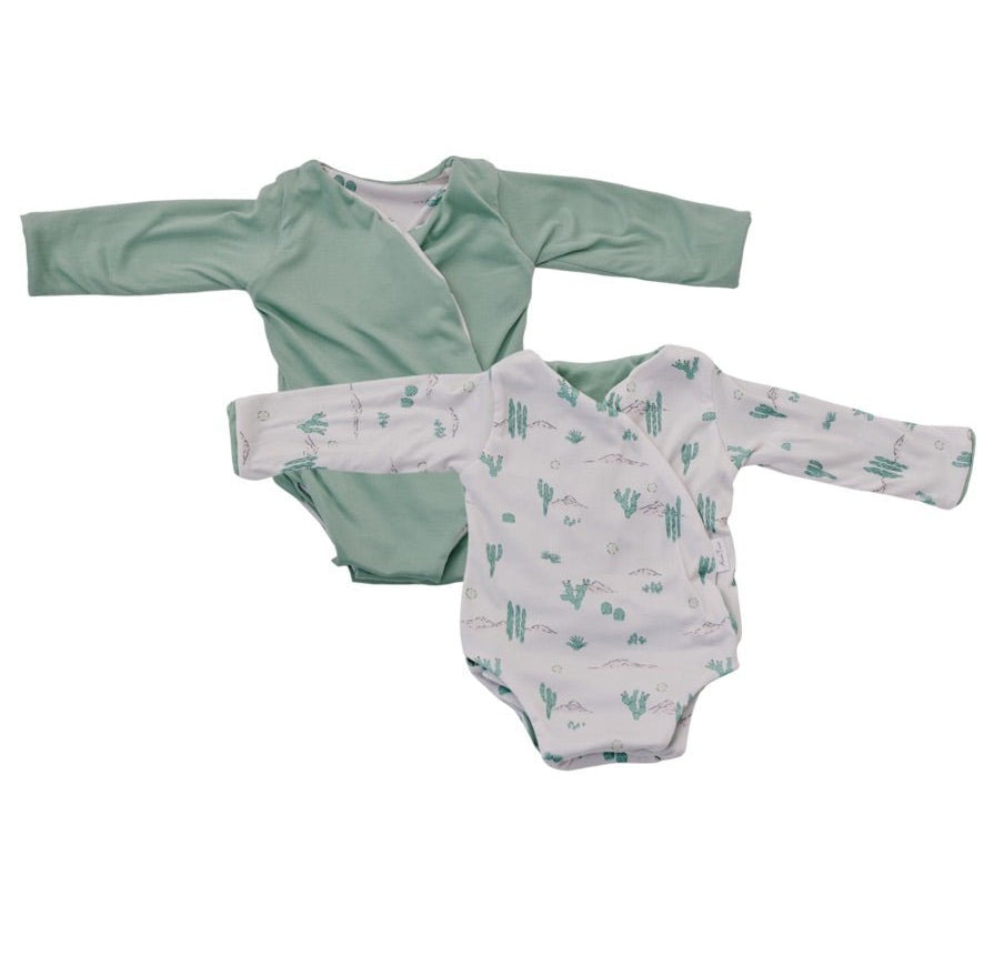 Reversible long-sleeve winged bodysuit in desert sunsets design.