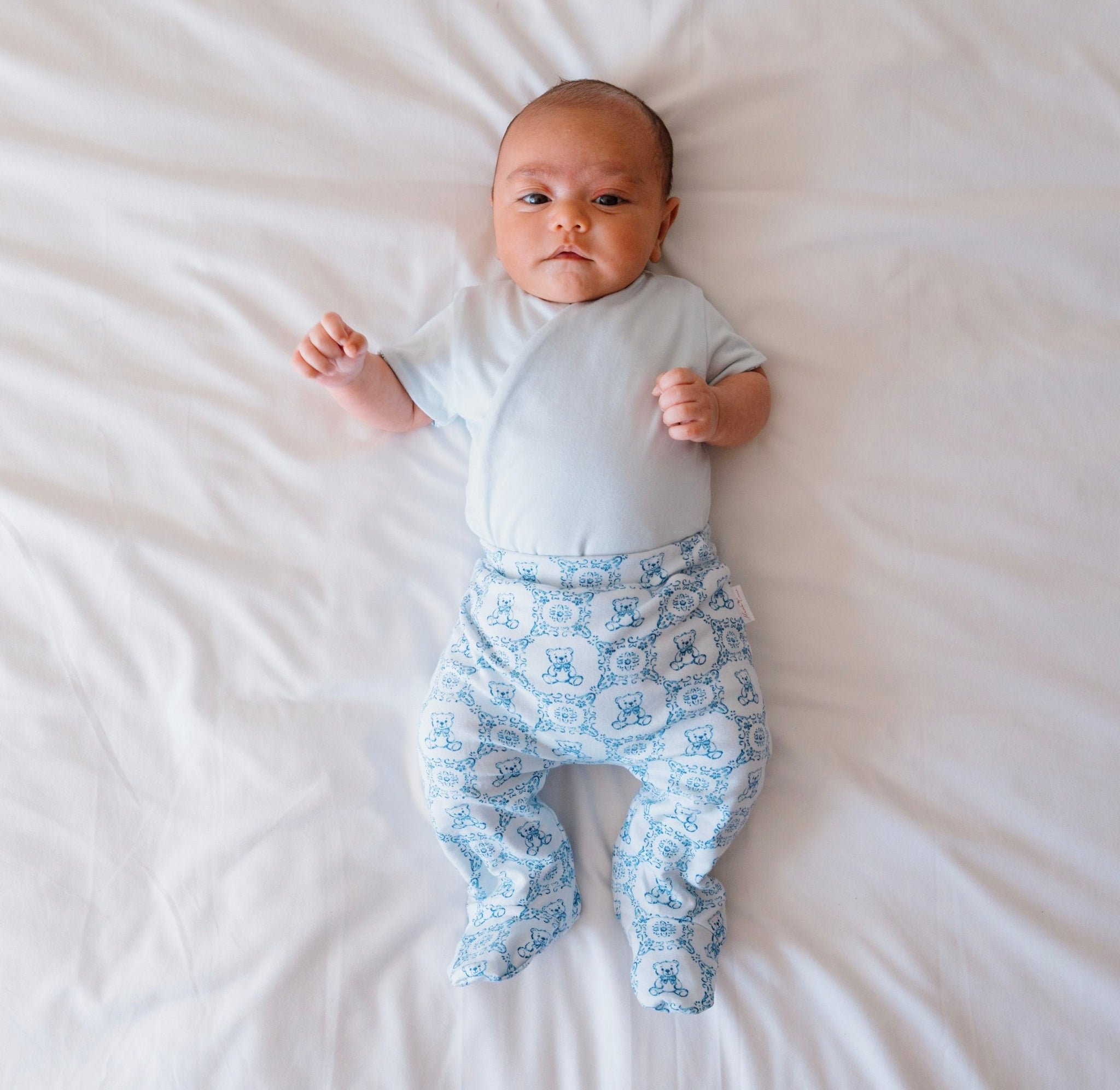 Reversible short-sleeve baby onesie outfit bundle in teddy tiles design.