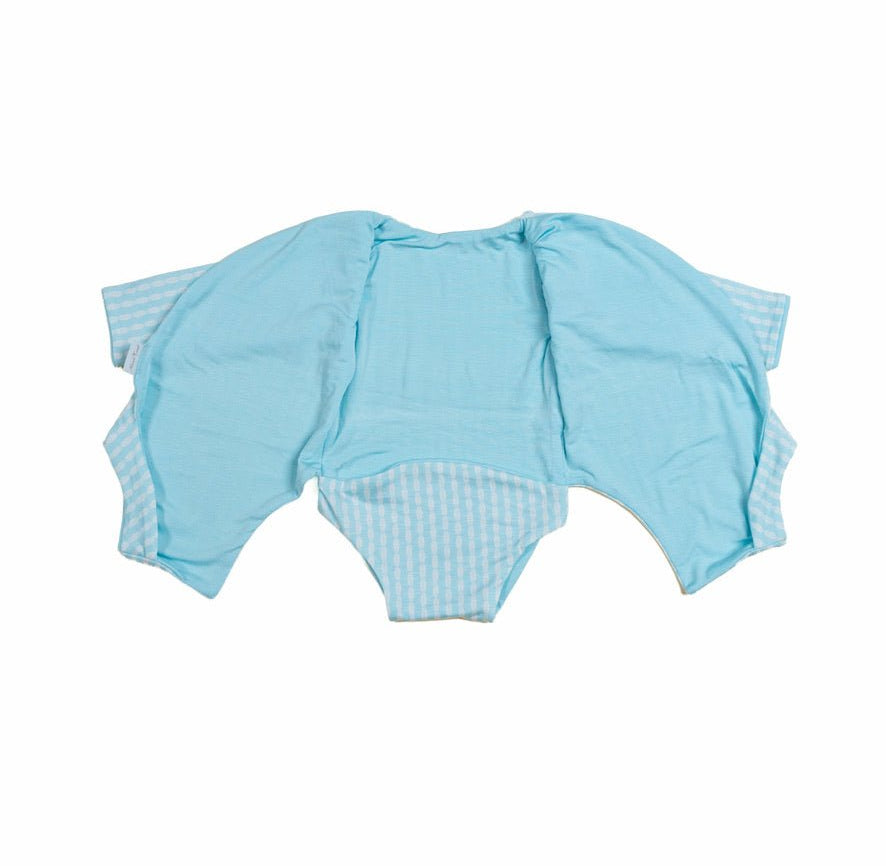 Reversible long-sleeved winged bodysuit for babies in silky modal fabric.