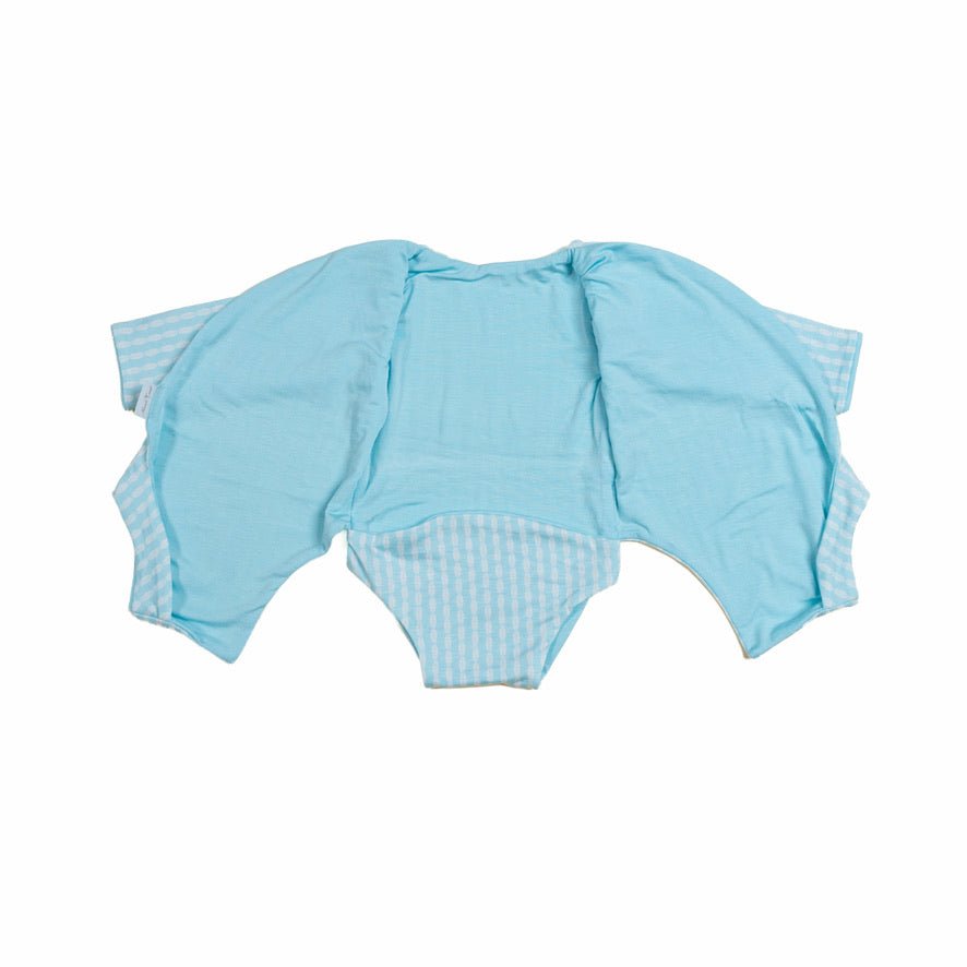 Reversible long sleeved winged bodysuit for babies in silky modal fabric.