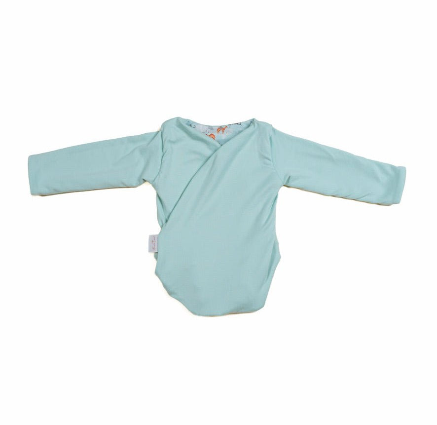 Reversible long sleeved winged bodysuit for babies in classic brushed fabric.