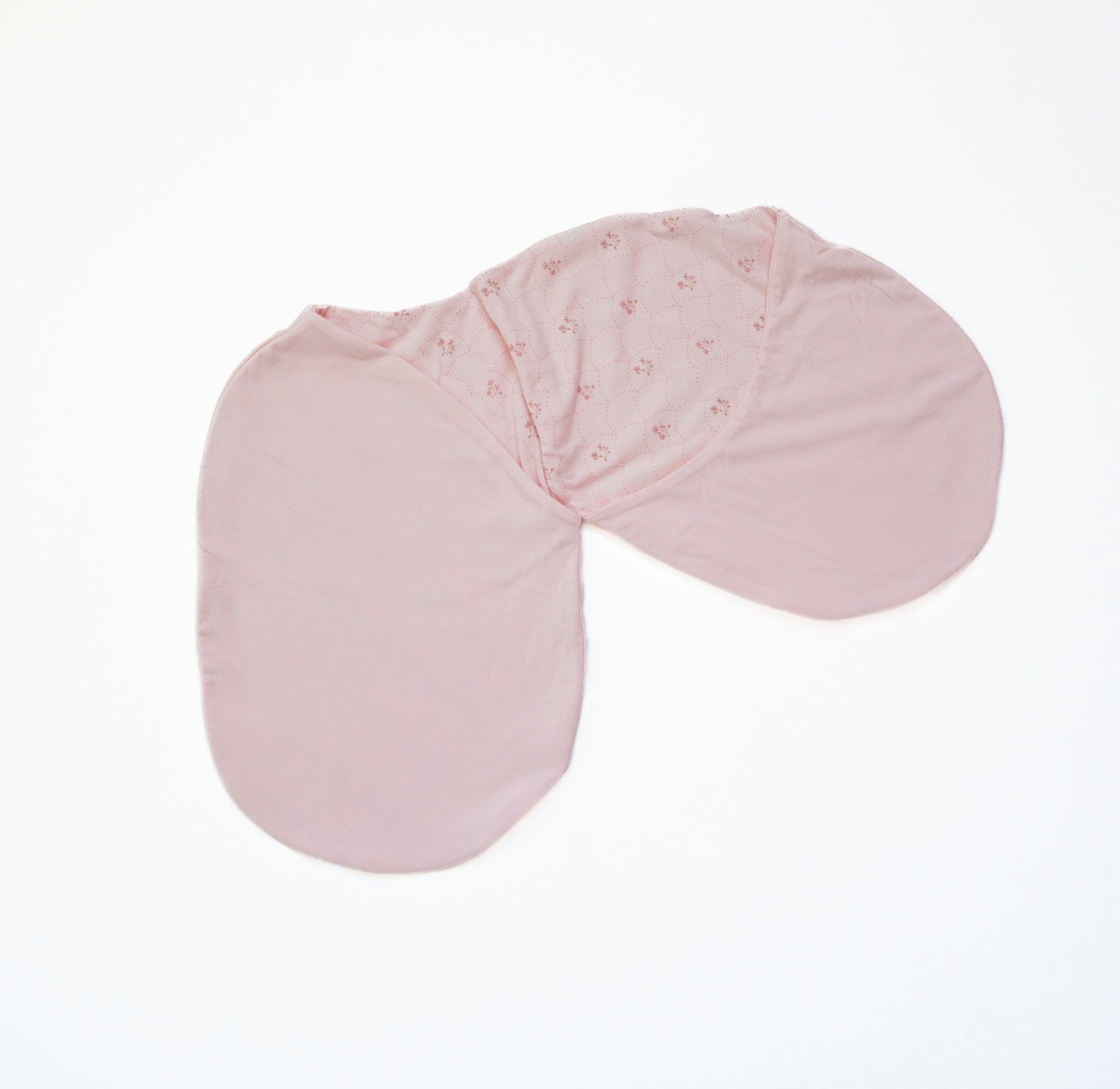 Reversible baby cocoon swaddle blanket made from bamboo-organic cotton blend featuring Dainty Dots design.
